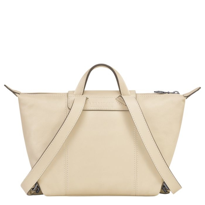 Women's Longchamp Le Pliage Cuir Backpacks Beige | 64NWMRPKS