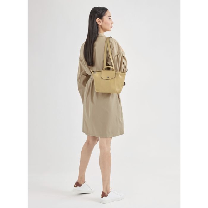 Women's Longchamp Le Pliage Cuir Backpacks Beige | 76JPGUWOB