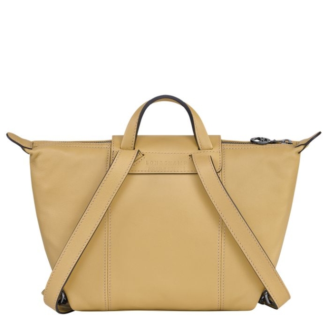 Women's Longchamp Le Pliage Cuir Backpacks Beige | 76JPGUWOB