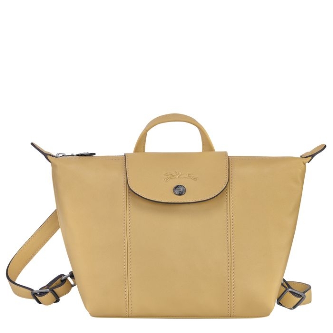 Women\'s Longchamp Le Pliage Cuir Backpacks Beige | 76JPGUWOB